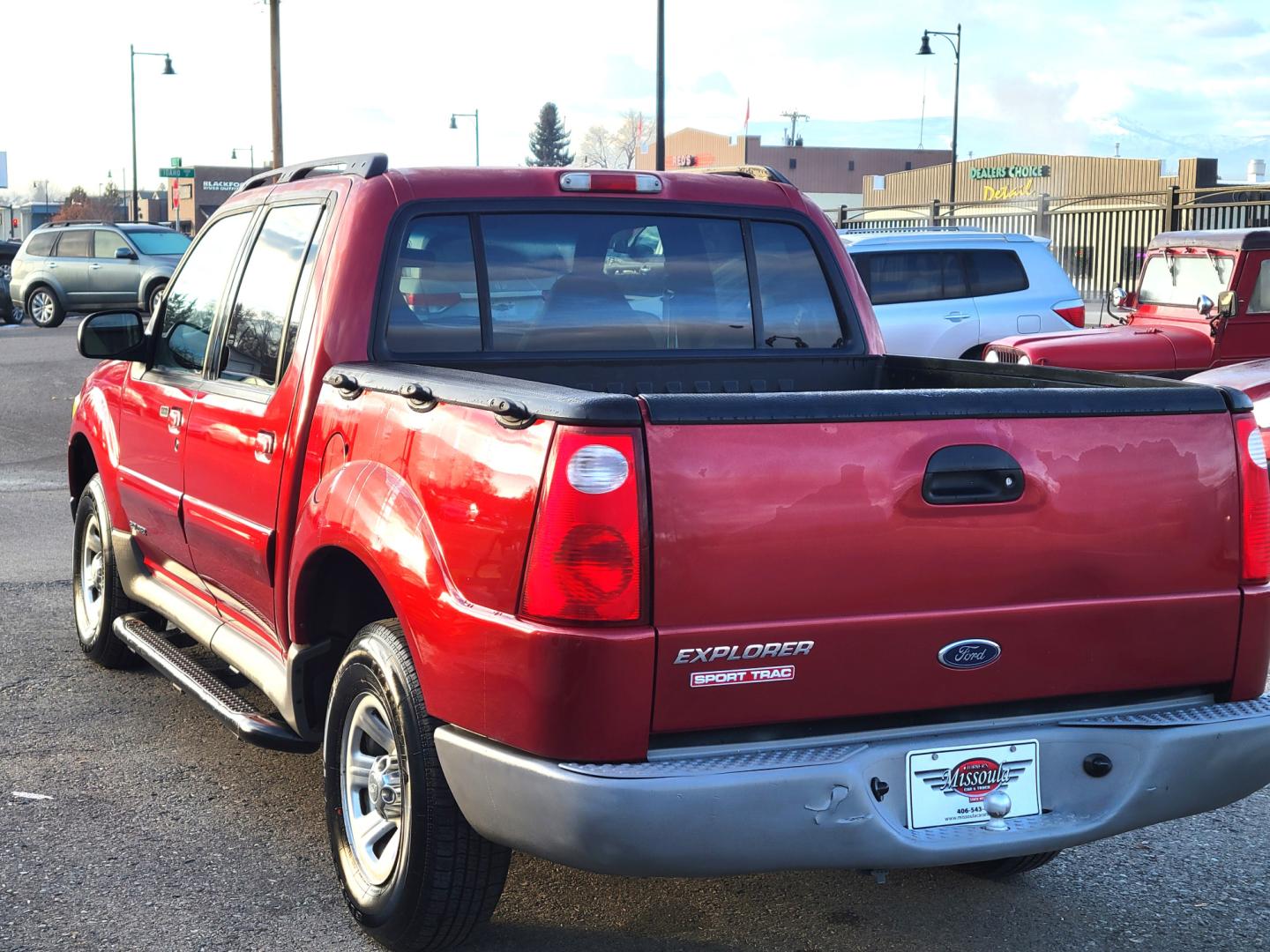 2001 Red /Gray Ford Explorer Sport Trac Sport Trac (1FMZU77E41U) with an 4.0L V6 engine, Automatic transmission, located at 450 N Russell, Missoula, MT, 59801, (406) 543-6600, 46.874496, -114.017433 - Highly Desirable little 4WD. Only 86K Miles. Air. Cruise. Tilt. Power Drivers Seat. Power Windows and Locks. AM FM CD Changer. Clean Carfax. This vehicle is more then 20 years old and is not eligible for lending through our finance companies. - Photo#4